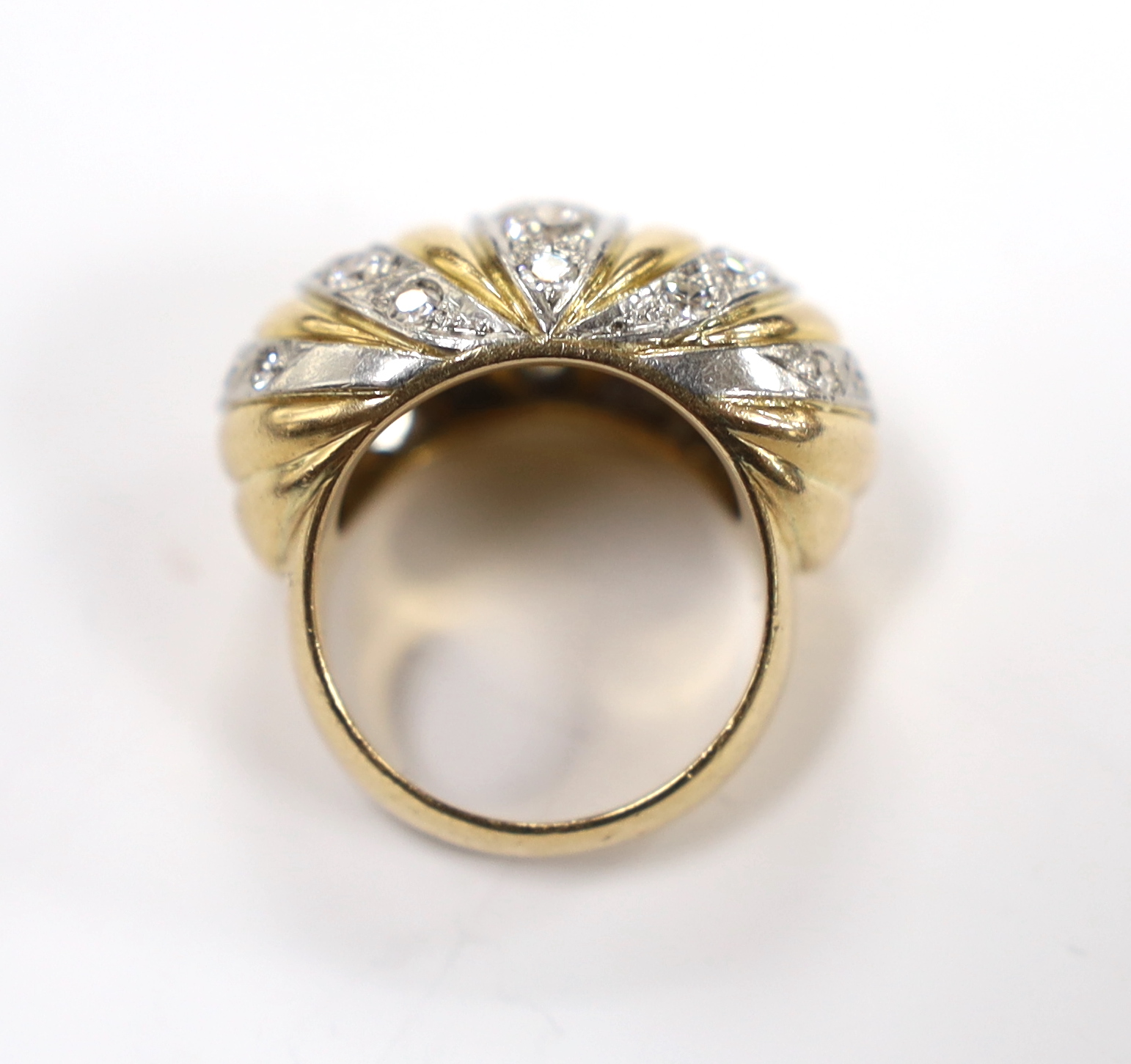 A yellow metal and diamond set five row line cluster set dress ring, size O, gross weight 17.7 grams.